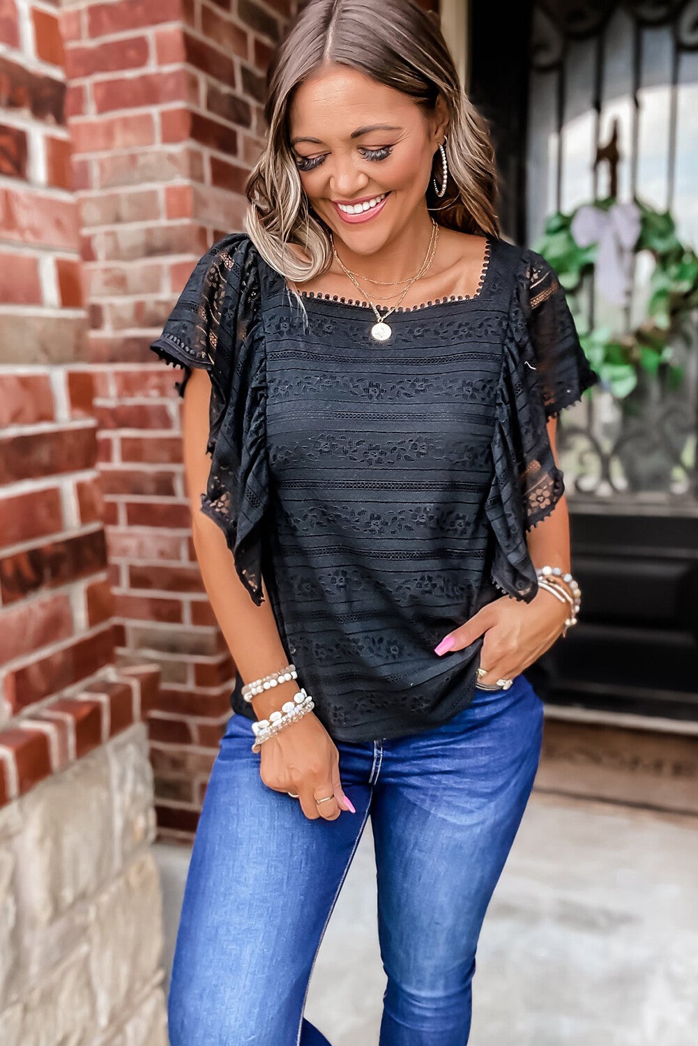 Blusa de encaje con volantes