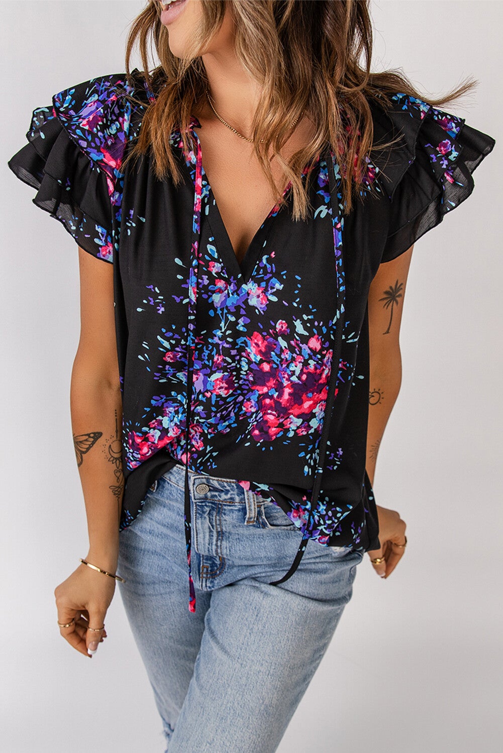 Blusa mangas de mariposa