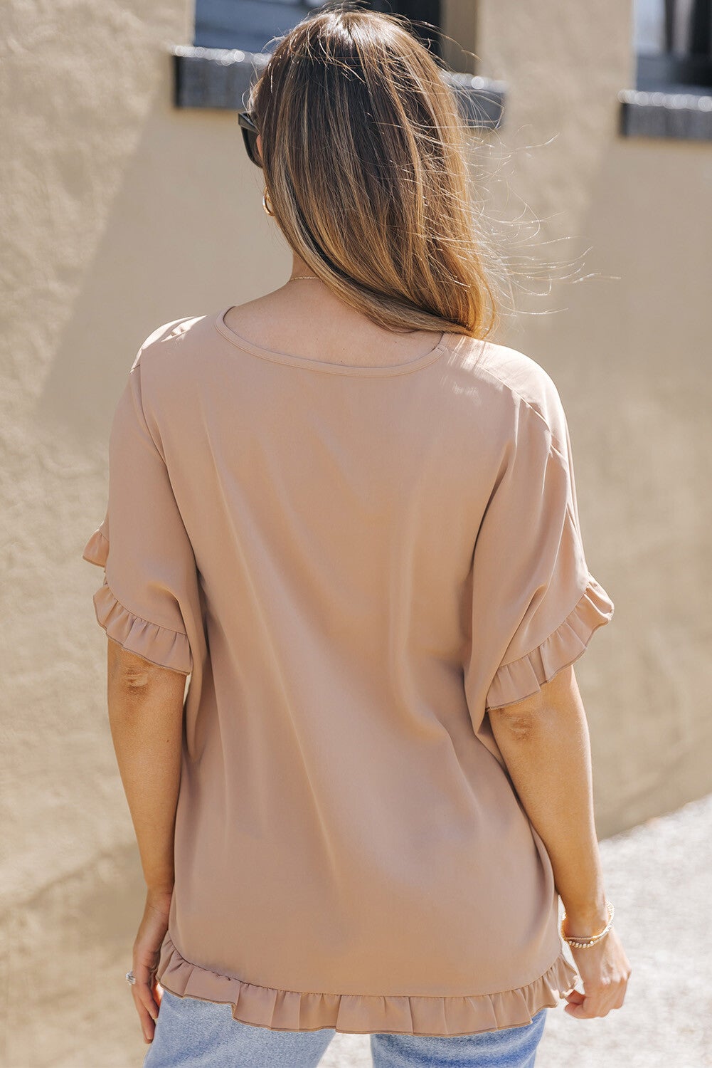 Blusa con ribete de volantes