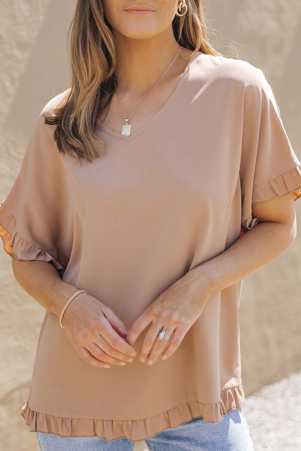 Blusa con ribete de volantes